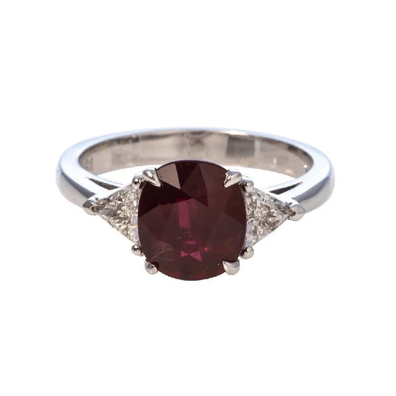 Premium Diamond Jewelry For Unforgettable Moments 2.52ct Cushion Ruby & .38ct Trillion Diamond Three-Stone 18K Gold Ring