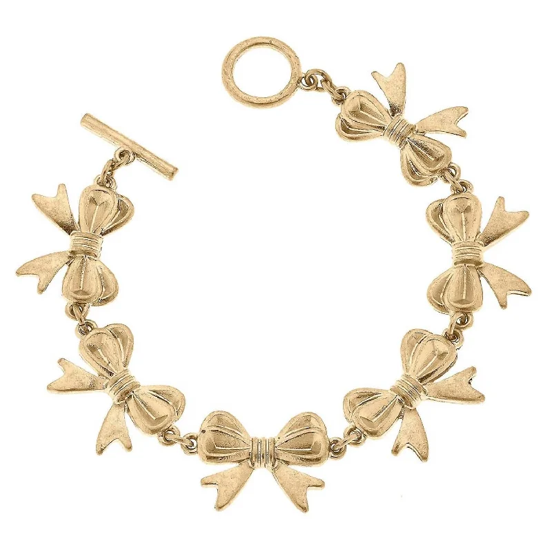 Women's Bow Linked Toggle Bracelet In Worn Gold