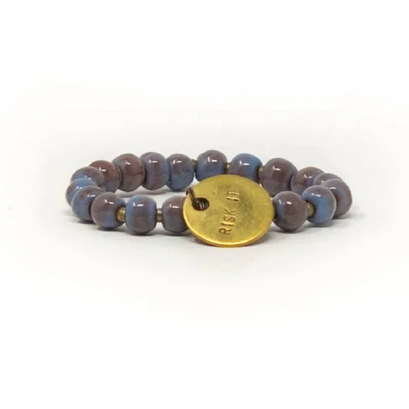 Women's Risk It Inspirational Charm Bracelet In Blue Dawn